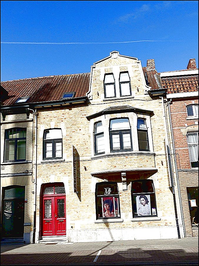 Voorgevel van rijwoning Mechelen te Mechelen waar een  plaatsbeschrijving bij huur werd uitgevoerd. 